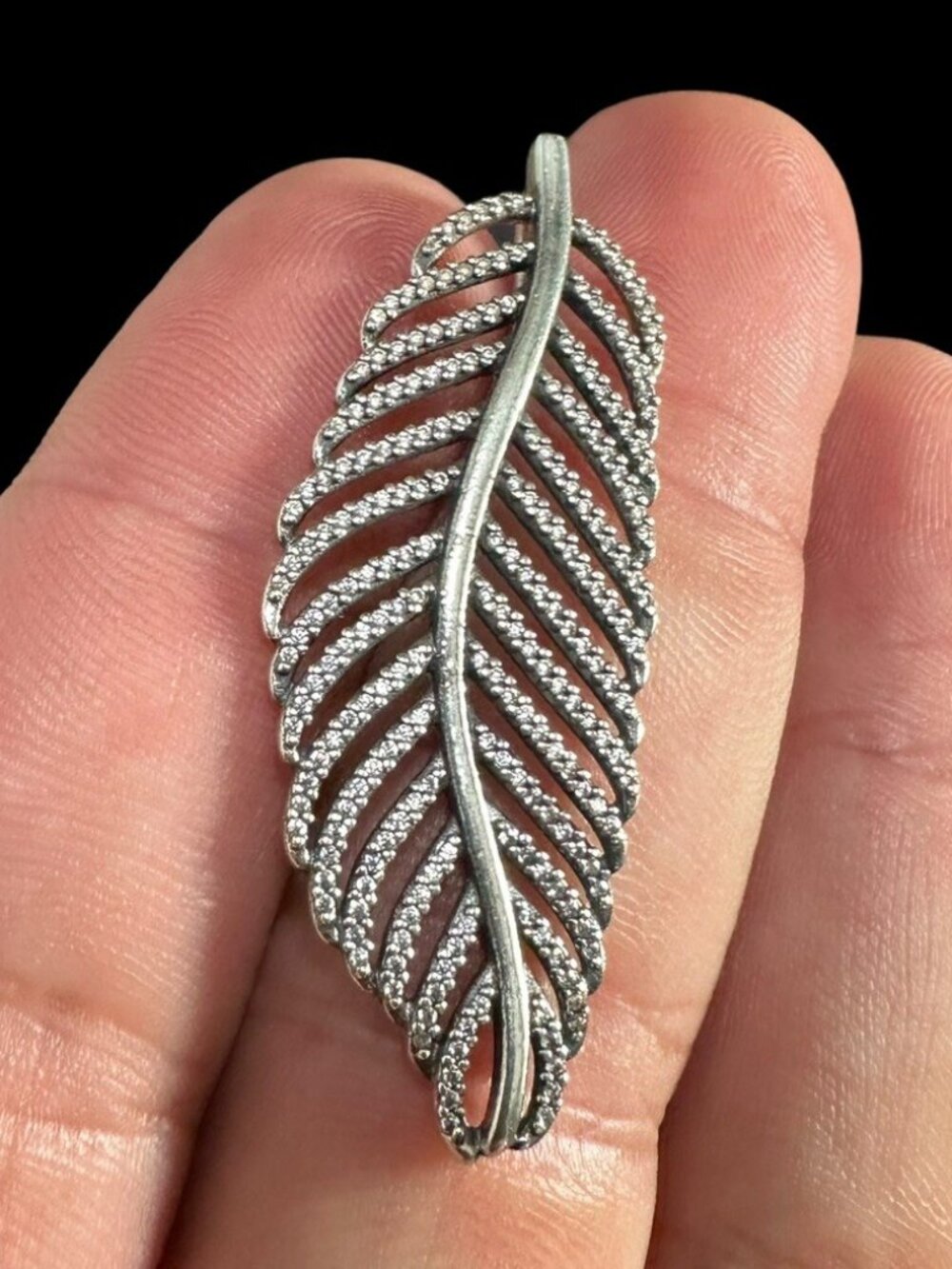 Pandora retired light as a feather pendant